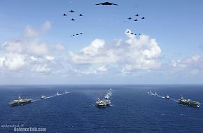 Carrier Strike Groups sail in formation - Valiant Shield 2006.
