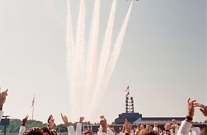 Blue Angels fly-by formation over the graduating ceremony