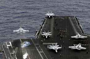 US Navy F/A-18F Super Hornet launches from USS Kitty Hawk