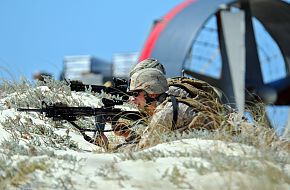 Marines take tactical positions, Amphibious beach assault