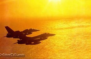 Pakistan Airforce F-16A/B over the Arabian Sea in a golden evening sun (PAF
