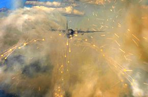 C-130H Hercules deploys flares over Alaska