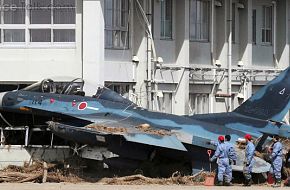 F-2 Aircraft hits building during Japan Tsunami