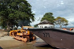 Bulldozer unloading from Fast Craft at Meulaboh