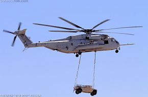 USMC CH-53E Super Stallion Helicopter transporting HMMWV