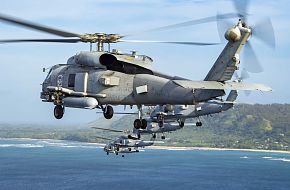 US Navy MH-60R Seahawk Helicopters Fly In Formation