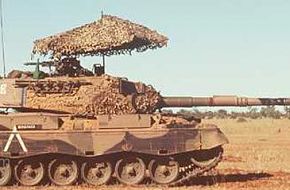 A rare pic of an Australian AS1 Leopard tank with it's "Barracuda&quot