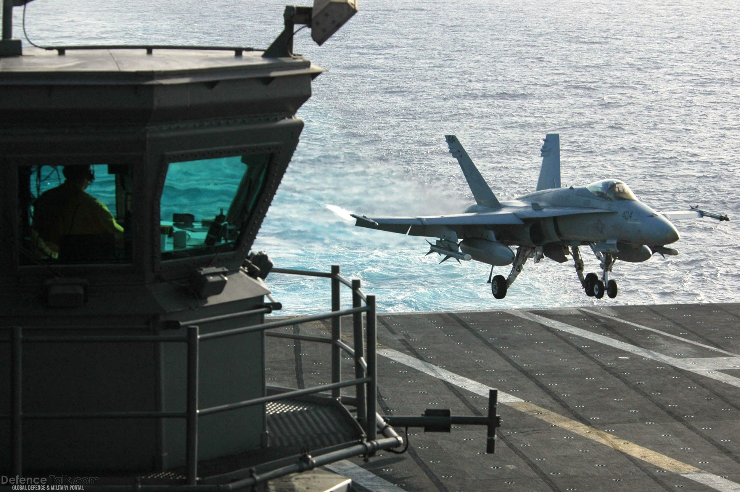 Aircraft lands on USS Kitty Hawk (CV 63) Aircraft Carrier - US Navy