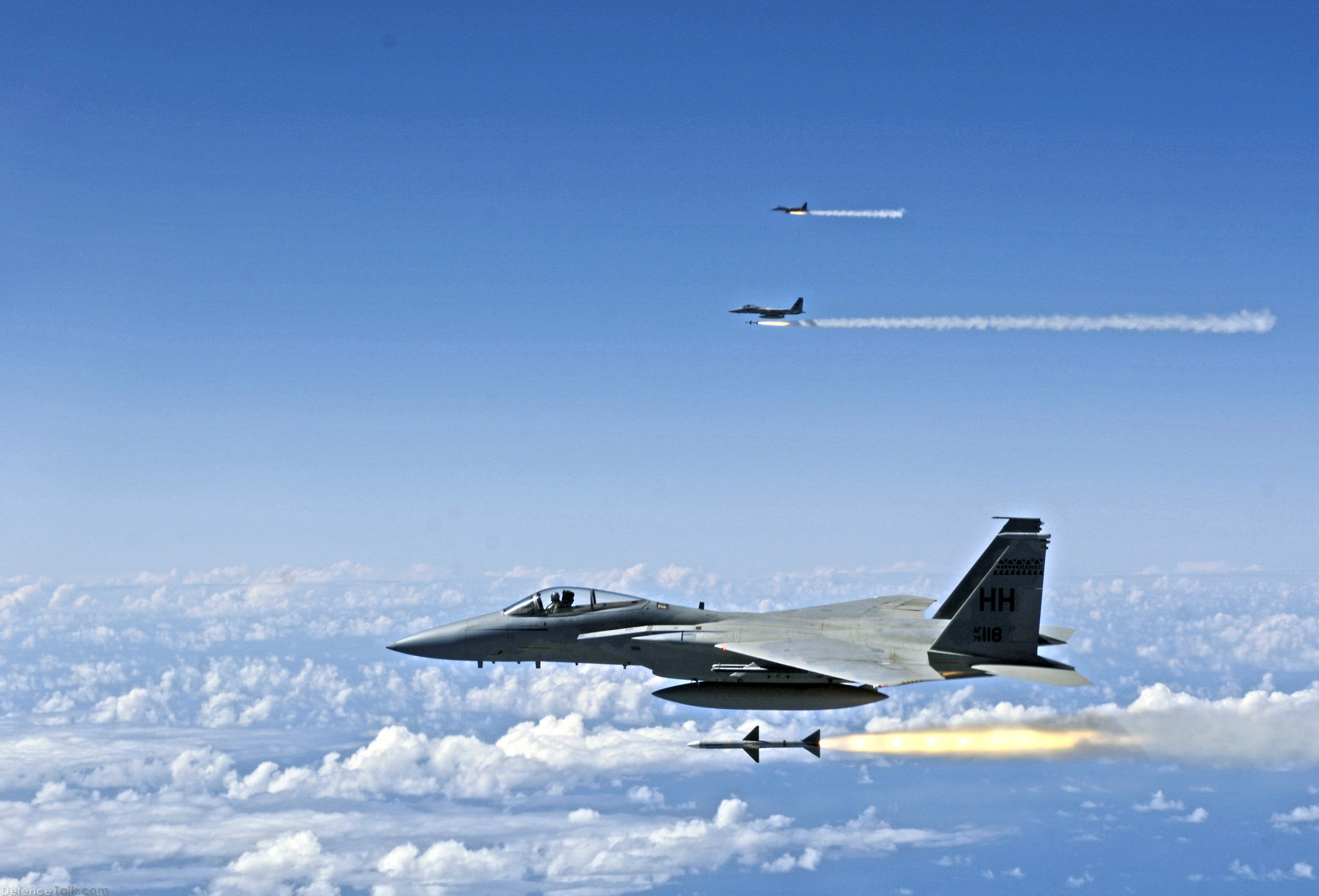 F-15 Eagles fire AIM-7 Sparrow missiles