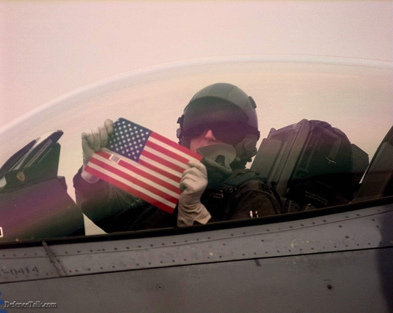 USAF pilot with US flag.