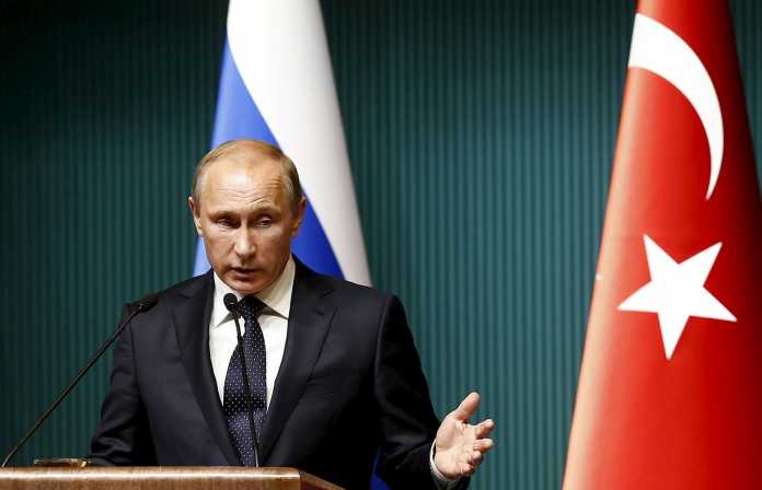 File photo of Russia's President Putin attending a news conference at Presidential Palace in Ankara