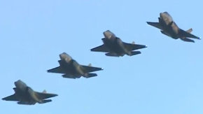 Four F-35Bs Arrive Slow Landing RAF Marham June 2018 TITLE.jpg