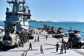 Canberra with 7 helos on flight deck Sea series 2018.jpg