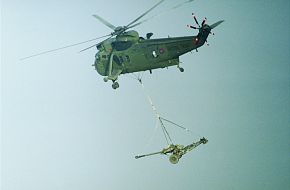 ROYAL NAVY SEA KING WITH 105MM LIGHT GUN