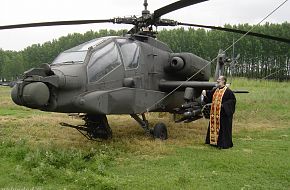 A greek orthodox priest bless an AH-64A+ Apache Hellenic Army