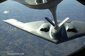 A KC-135R refuels B-2 Spirit Bomber - US Air Force