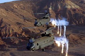 Chinooks over Afghanistan - flaring off to suppress SAMs