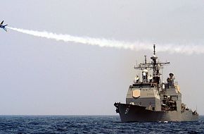 fly-by of the guided missile cruiser - US Navy