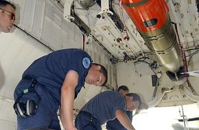 Live Torpedo's being loaded into Aussie AP-3C Orions at Rimpac 2004
