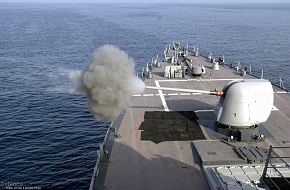 USS Curtis Wilbur DDG 54, Mk 45 gun performs PAC Fire guided missile destro