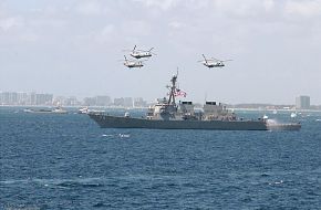 CH-46 transport helicopters fly over DDG 74 - US Navy