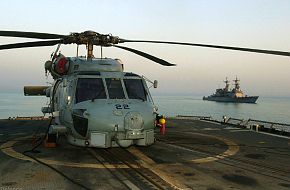 USS Mobile Bay CG-53 and SH-60 Helicopter