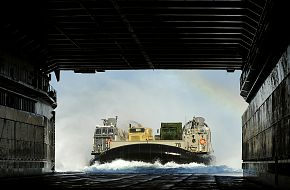 A landing craft approaches LSD 43 - Bright Star 2009