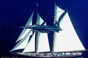 F-5 passing a ship.