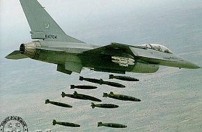 A Pakistani F-16A, #84704, releasing 12 Mk.82's during a medium-altitude di