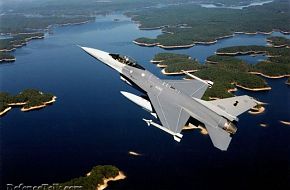 A beautiful shot of a Thai A/F F-16 over a river.