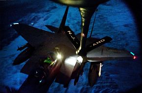 F-15 Strike Eagle is refueled by a KC-135