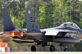 An F-15E Strike Eagle takes off during a Turkey Shoot training