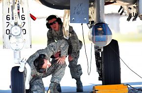 Aircraft Maintenance Unit perform a pre-flight inspection on an F-15E