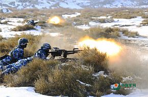 China Marines shoot tripod-mounted heavy machine guns