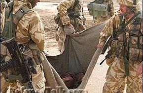 British Troops With Wounded Prisoner