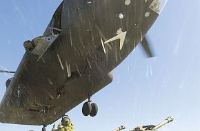 Australian Army CH-47D about to lift two 105mm Hamel guns.