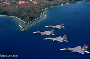 OVER GUAM -- Four F-15E Strike Eagles fly in formation
