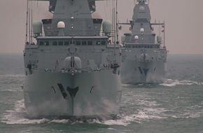 Two german Type 124 frigates in formation.