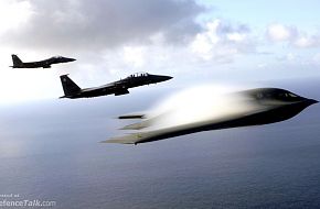 A B-2 Spirit and F-15E Strike Eagles