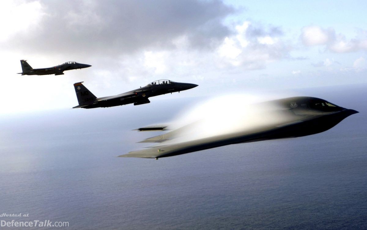 A B-2 Spirit and F-15E Strike Eagles