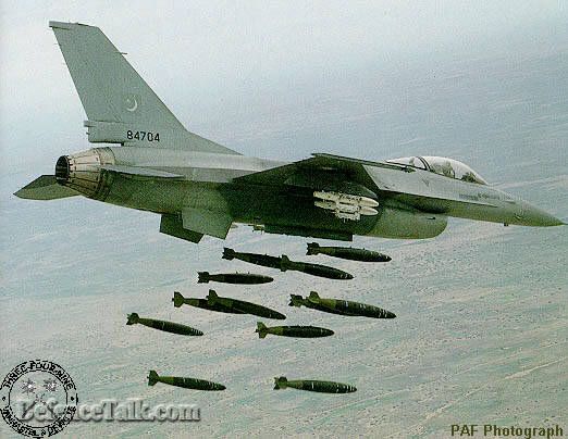 A Pakistani F-16A, #84704, releasing 12 Mk.82's during a medium-altitude di