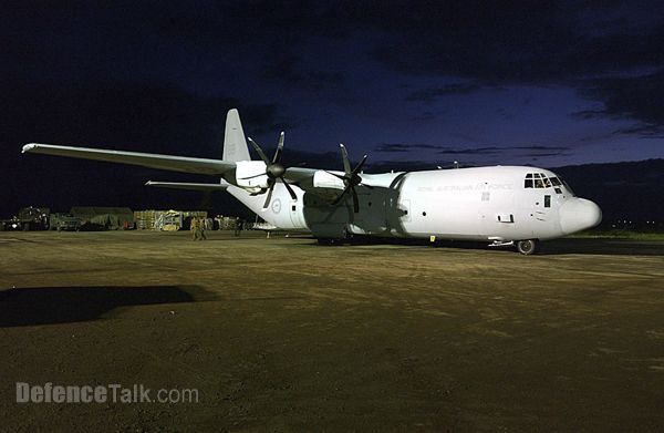 A RAAF C-130J parked on the ramp in Aceh moving internally displaced person