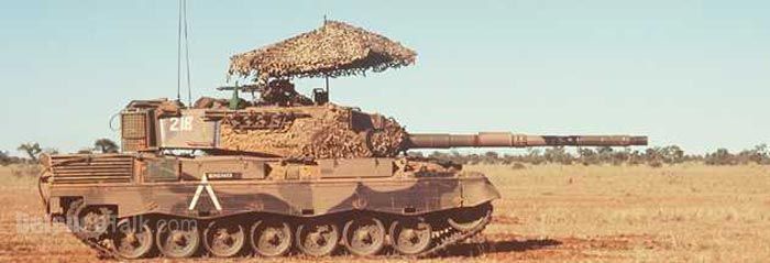 A rare pic of an Australian AS1 Leopard tank with it's "Barracuda&quot