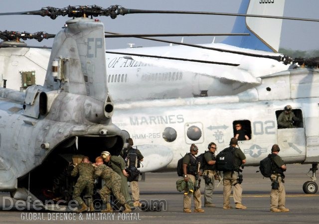 American Marines load their equipment - News Pictures