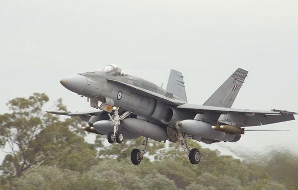 An Aussie F/A-18A loaded up with Mk 82 bombs