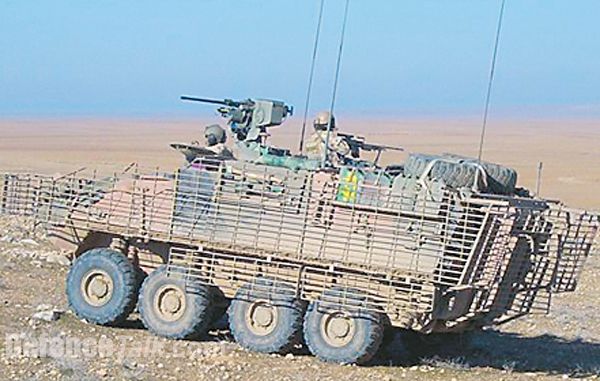 An Australian ASLAV in Iraq fitted with new "bar armour" to stop