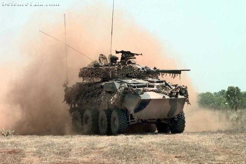 ASLAV 25 Gun car kicking up dust