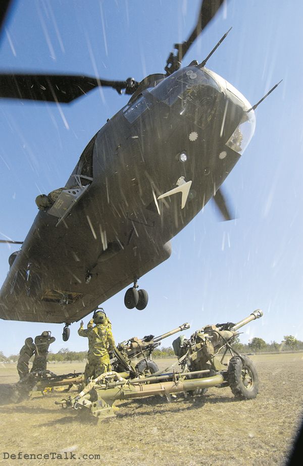 Australian Army CH-47D about to lift two 105mm Hamel guns.