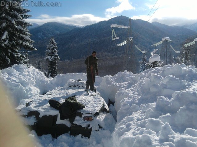 BTR-80 buried in snow