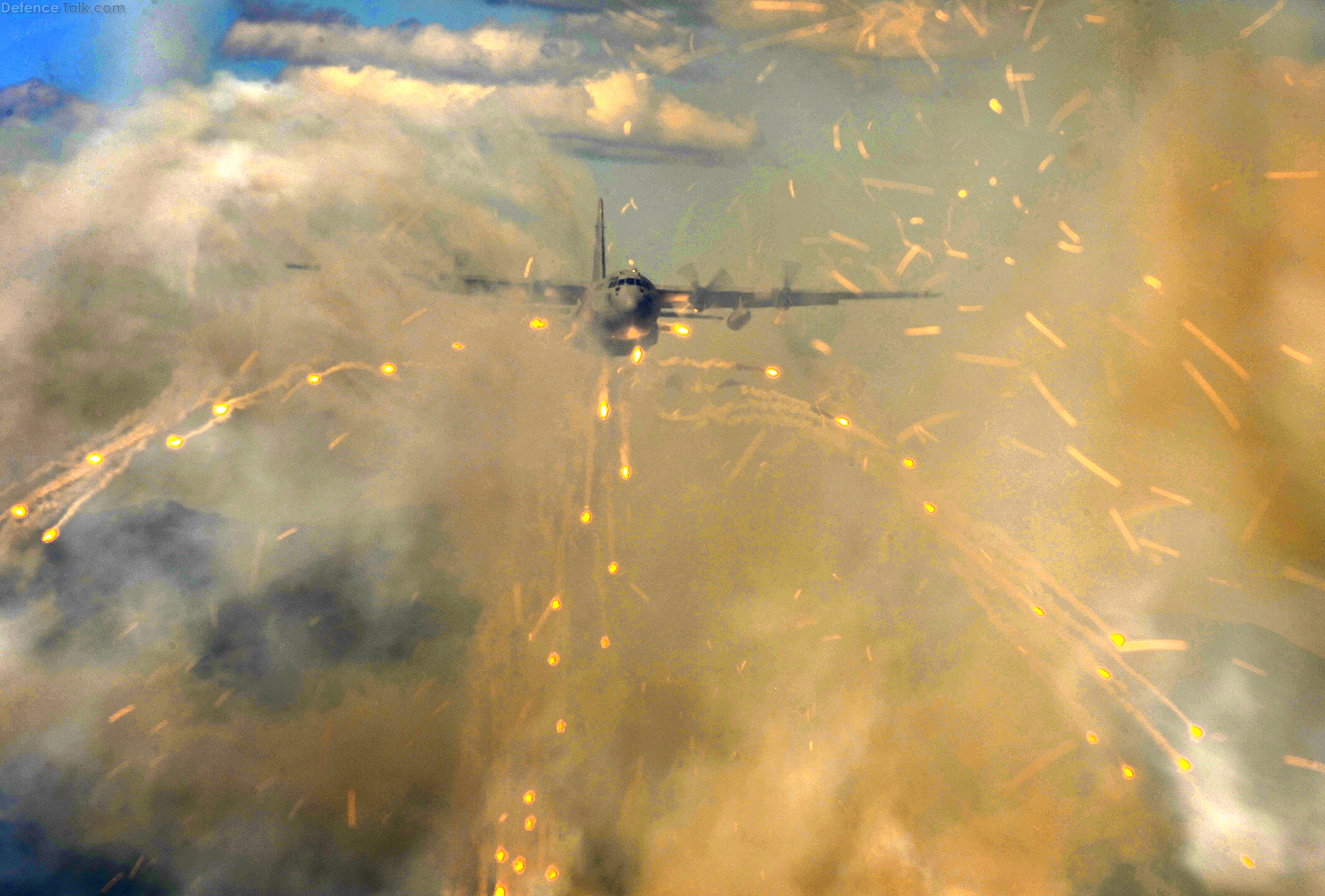 C-130H Hercules deploys flares over Alaska